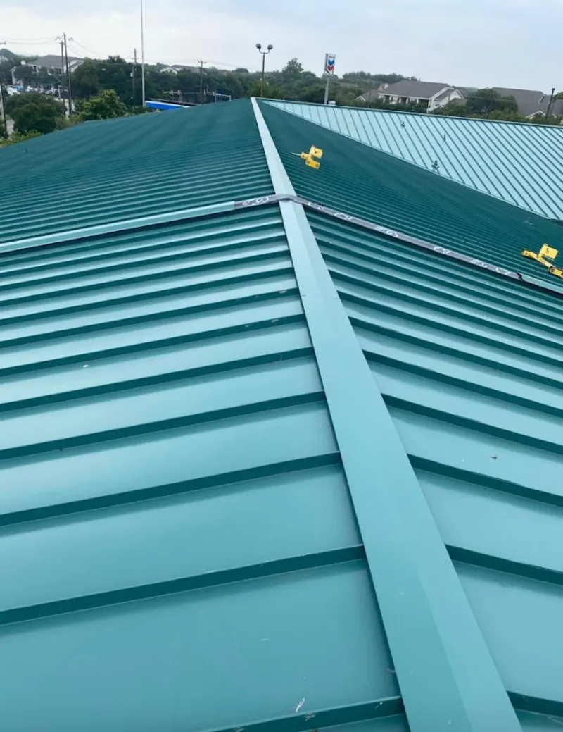 Green commercial metal roof ridge and valley for Metal Roof Repair in Portage